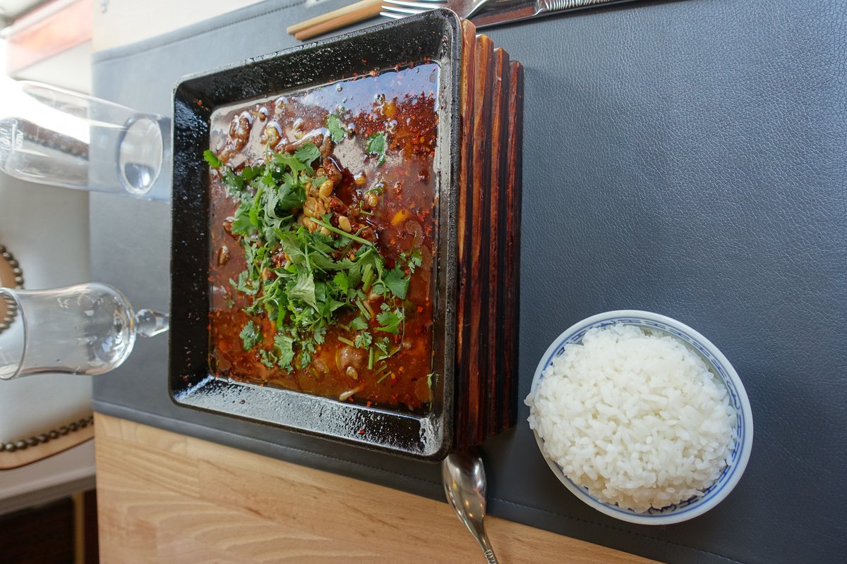 Sichuan Boiled Beef Shui Zhu Niu Rou in chili oil with scallions