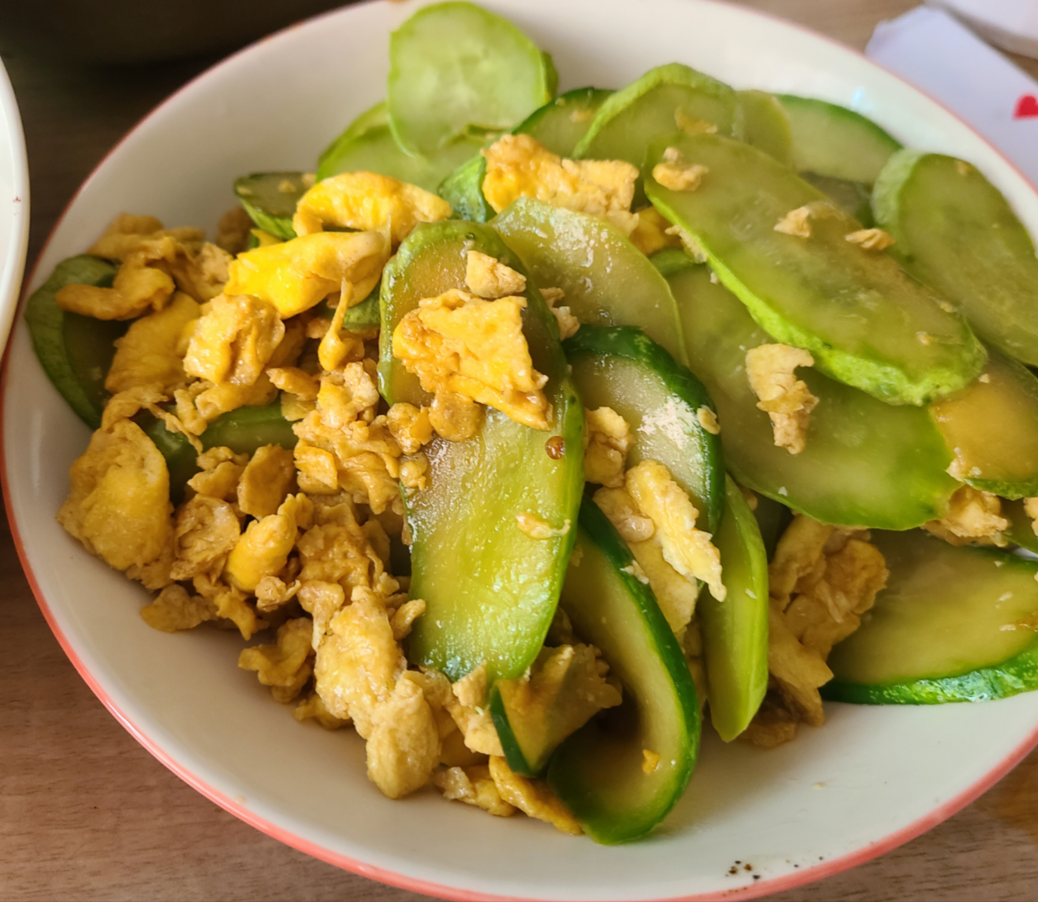 Cucumber and egg stir fry Chinese home dish
