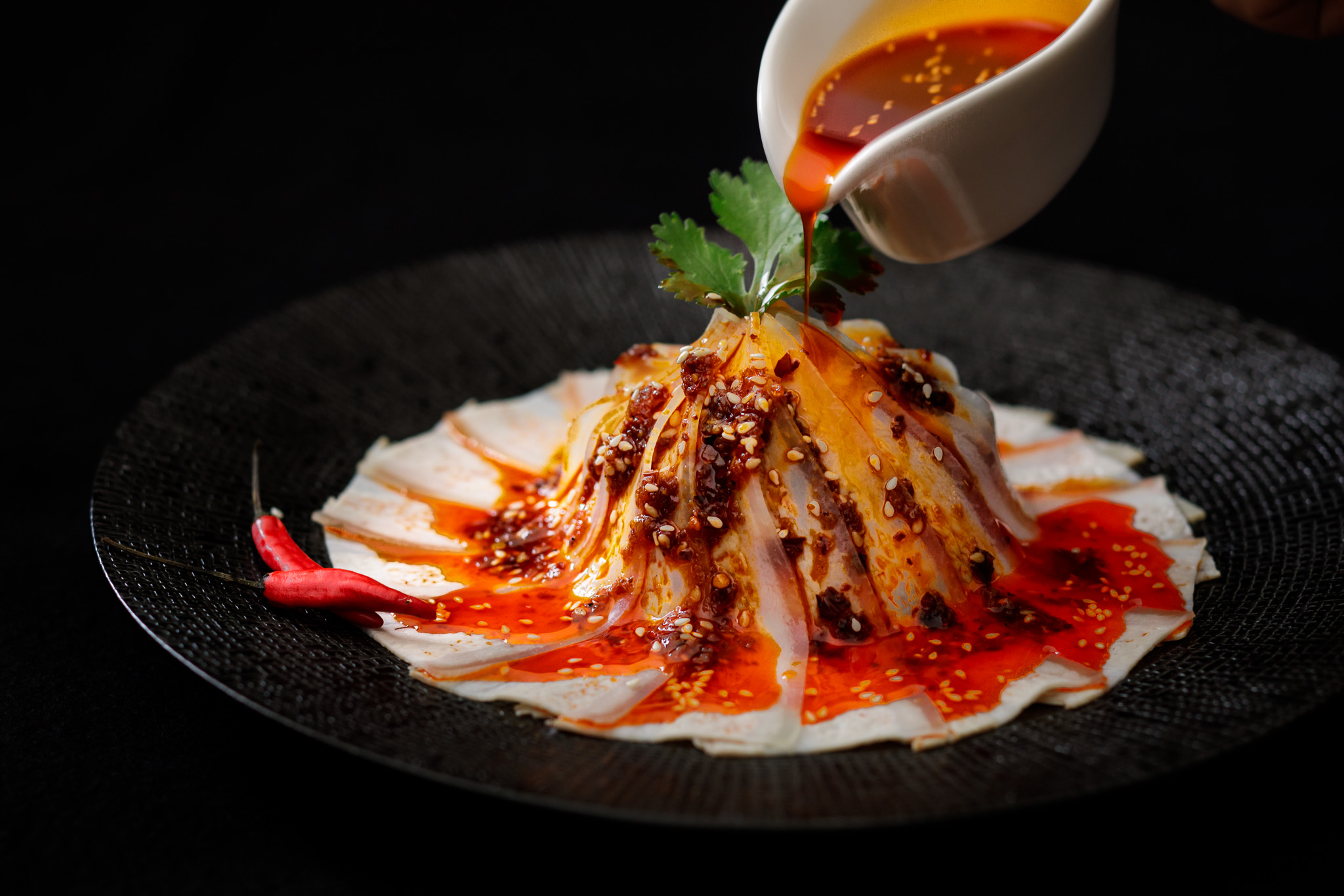 Garlic white pork Sichuan style with chili oil sauce