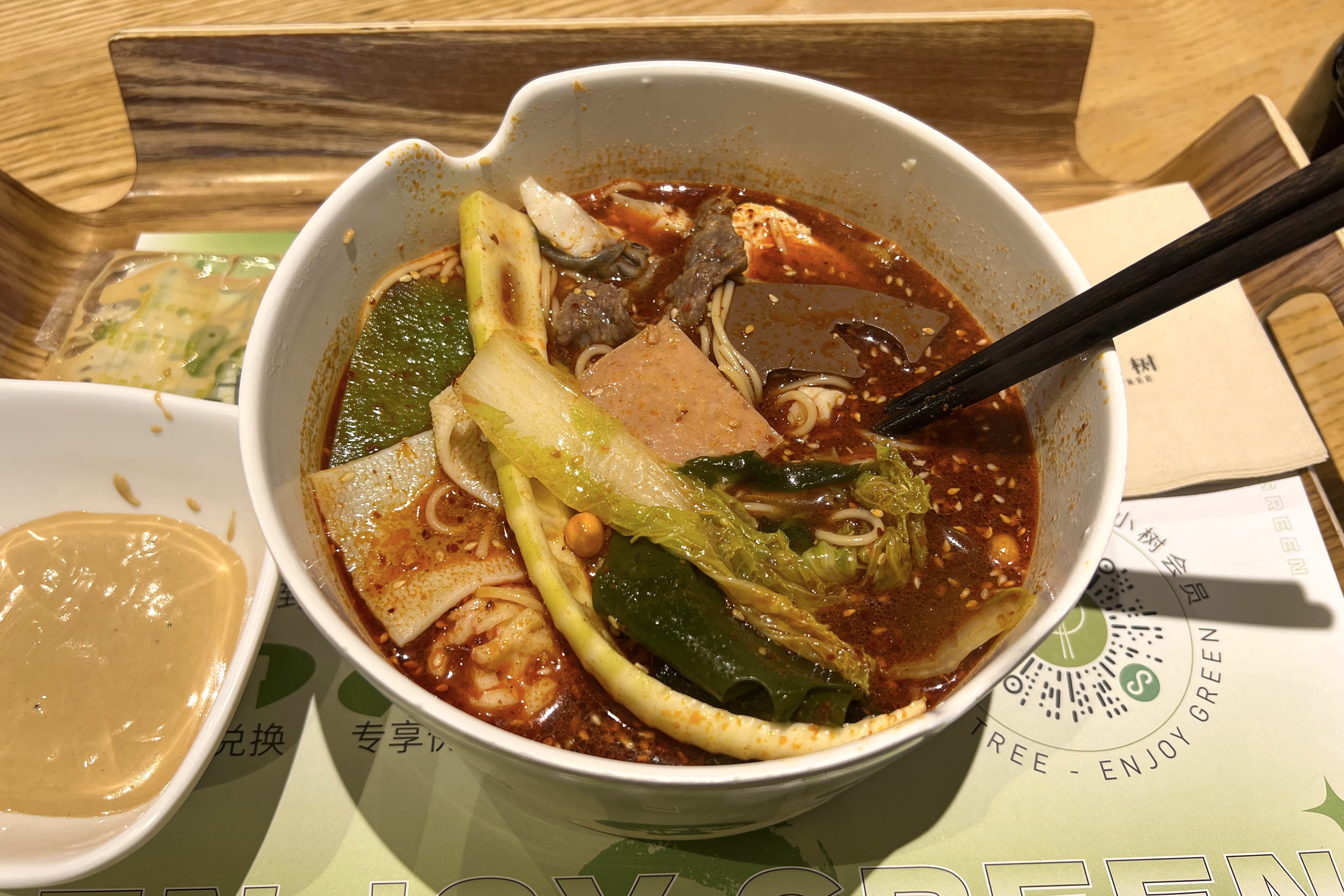 Mala tang bowl with noodles vegetables and chili oil
