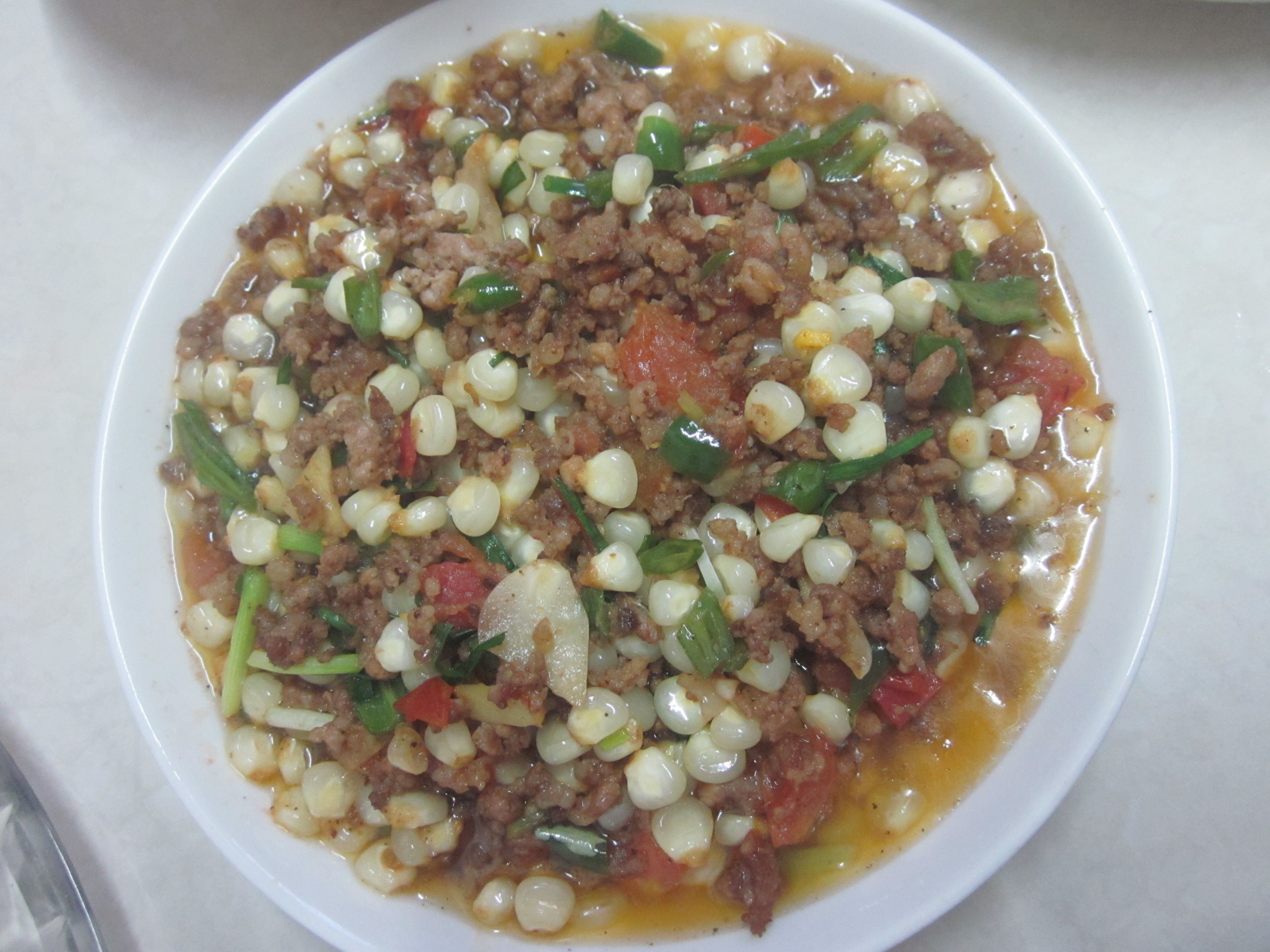 Fried pork with corn Hunan style with chilies