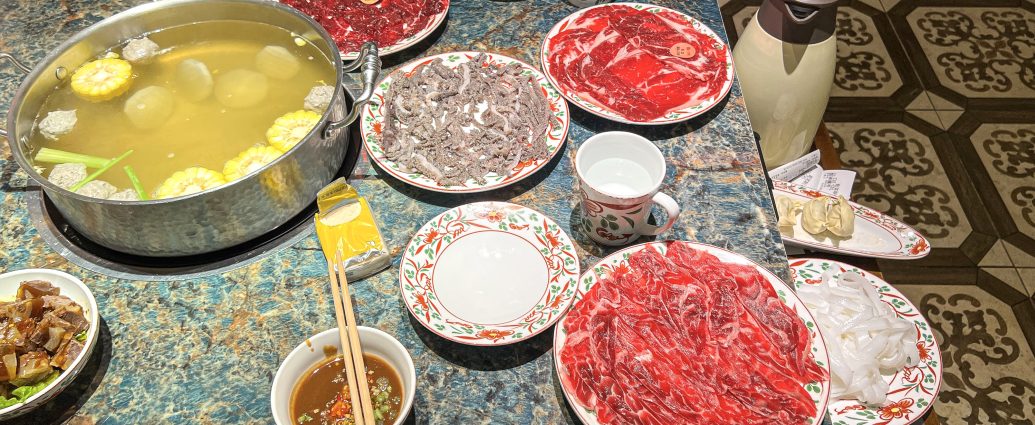Chaoshan beef hotpot with thin-sliced beef and vegetables in clear broth