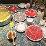 Chaoshan beef hotpot with thin-sliced beef and vegetables in clear broth