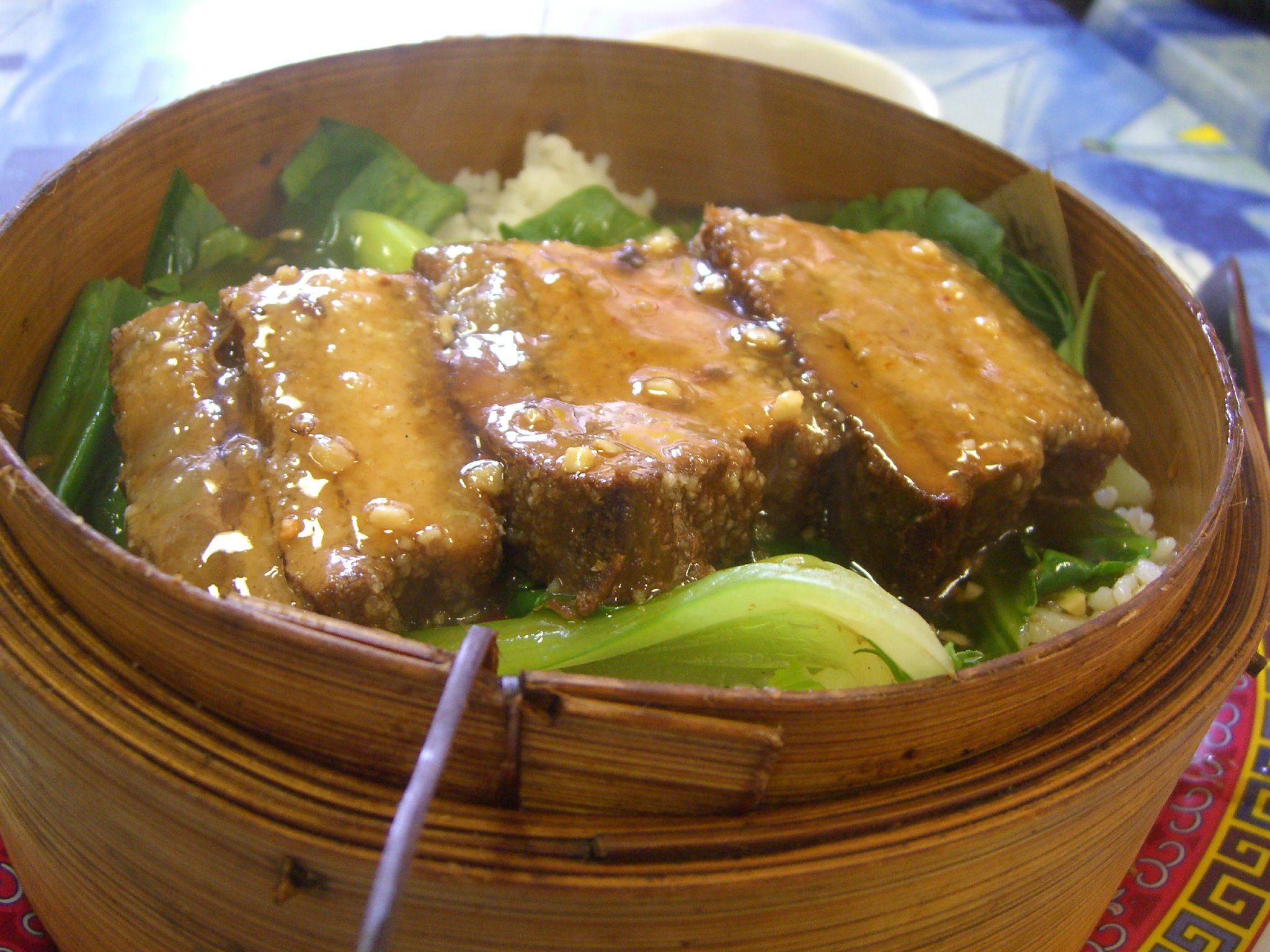 Hunan Fen Zheng Rou steamed pork with rice flour served on a plate