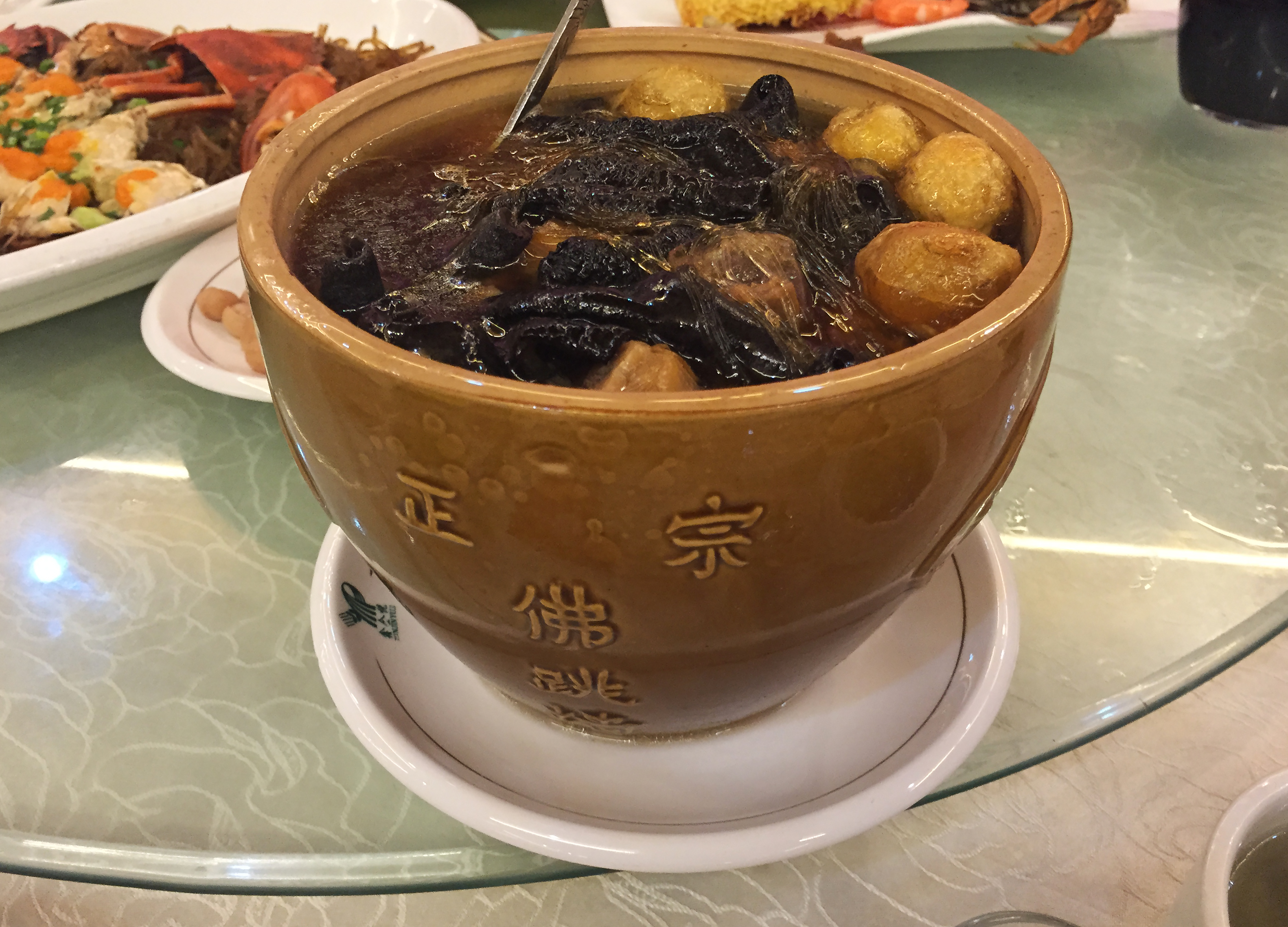 Fujian Fotiaoqiang Buddha Jumps Over the Wall soup with seafood in a clay pot