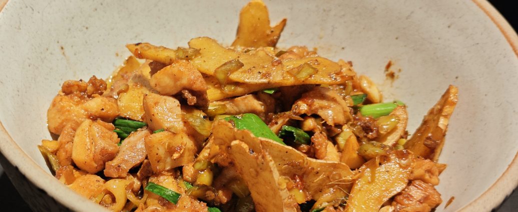 Hunan ginger chicken stir fry with plenty of ginger and green chilies