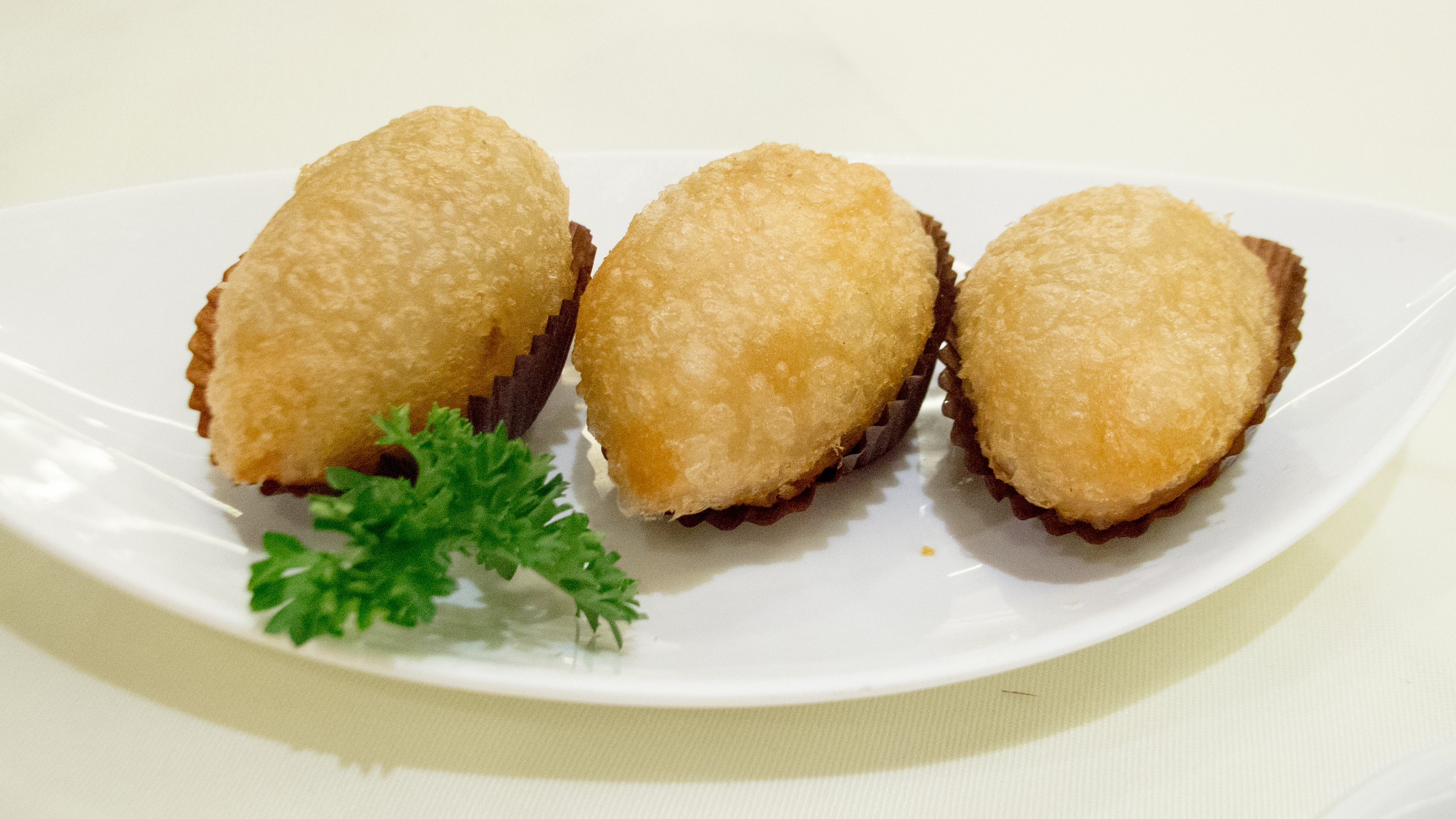 Cantonese Ham Sui Gok crispy golden glutinous rice dumplings with blistered crust