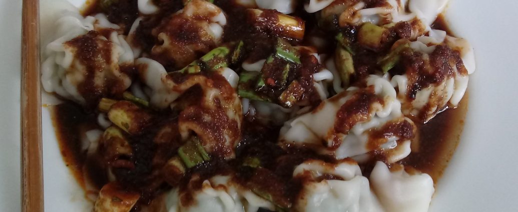 Sichuan Hong You Chao Shou chili oil wontons with sesame and scallions