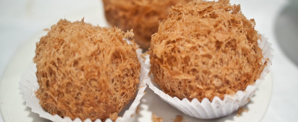 Woo Gok crispy deep-fried taro puffs filled with pork on a dim sum plate