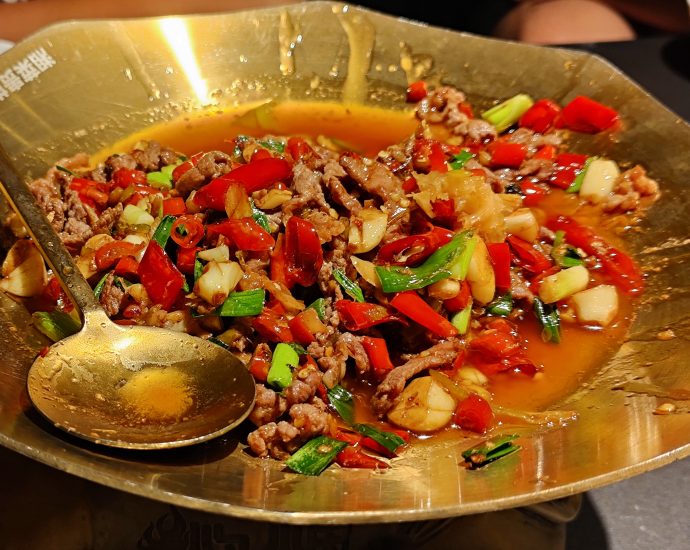 Hunan Xiao Chao Huang Niu Rou stir-fried beef with red chilies celery and pickled peppers