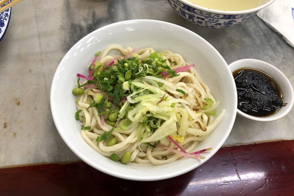 Zhajiangmian 炸酱面 Beijing fried sauce noodles with pork soybean paste and fresh vegetable garnishes